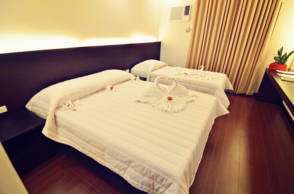 Citystate Asturias Hotel Palawan Puerto Princesa Bagian luar foto