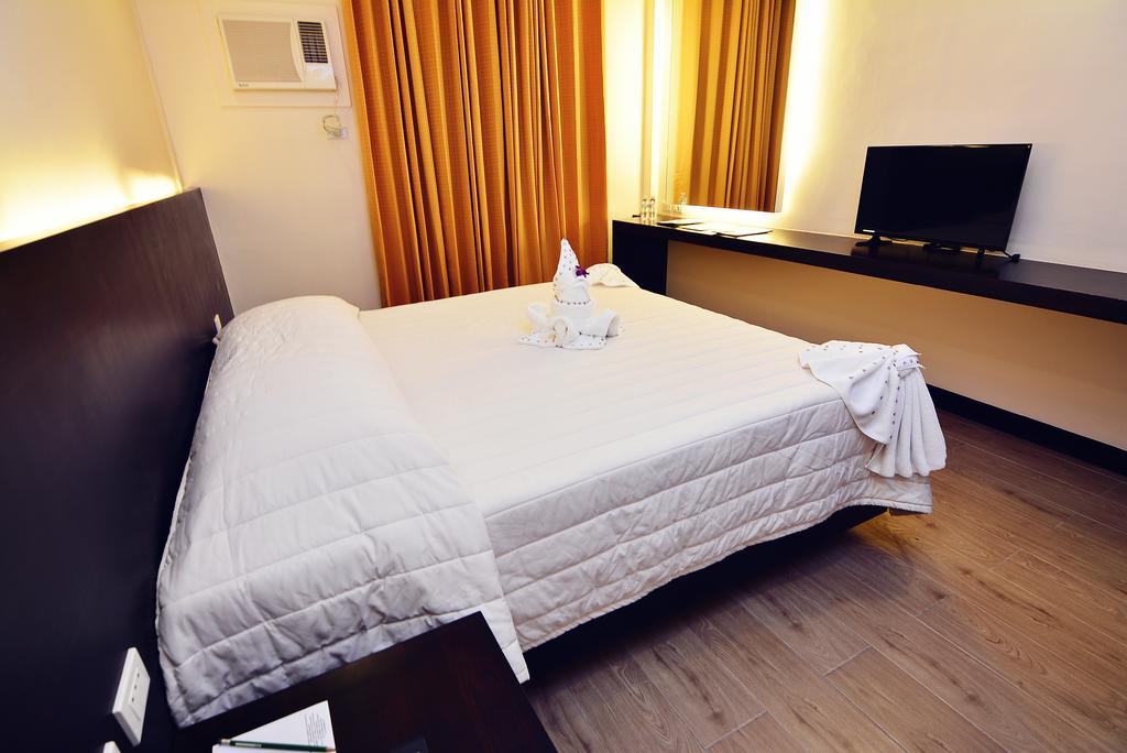Citystate Asturias Hotel Palawan Puerto Princesa Bagian luar foto