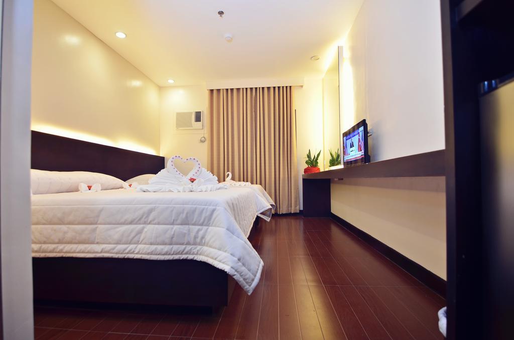 Citystate Asturias Hotel Palawan Puerto Princesa Bagian luar foto